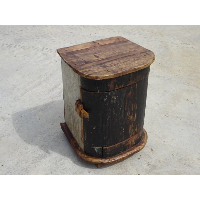 Bedside table or storage unit in solid teak reclaimed from a boat. Recycled wood from a dugout canoe, curved design. Teak...