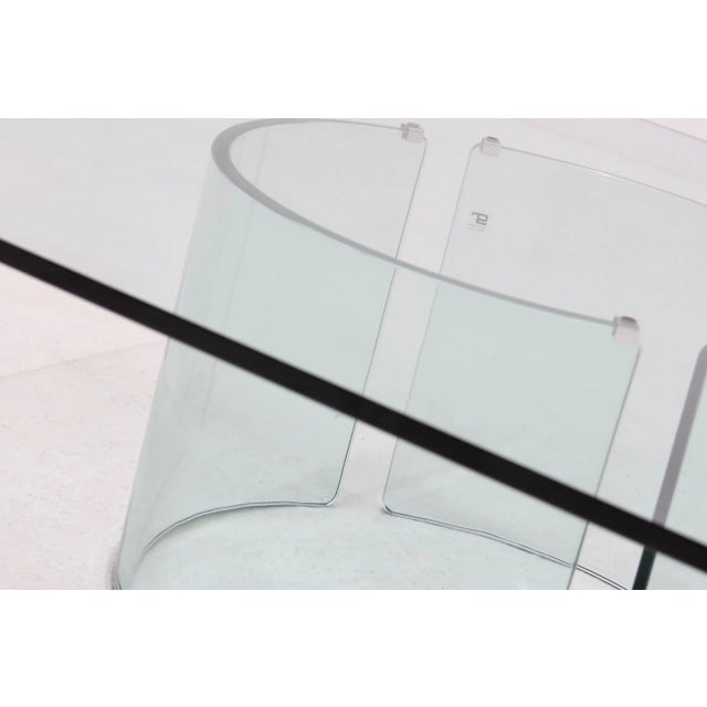 Italian modern coffee table by Gallotti & Radice from the 1970s. The piece features a large square glass top from 2cm...