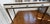The Julian Chichester Frank Console Table is a Jean-Michel Frank-inspired design piece featuring a slim silhouette, gilded...