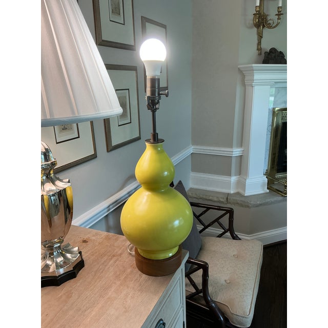 A striking handmade KleinReid ceramic table lamp in a beautiful, saturated chartreuse glaze. Handcrafted in New York City...