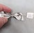 Silver Vintage C1976 Signed Napier Rhodium Plated Wavy Bow Brooch For Sale - Image 8 of 8
