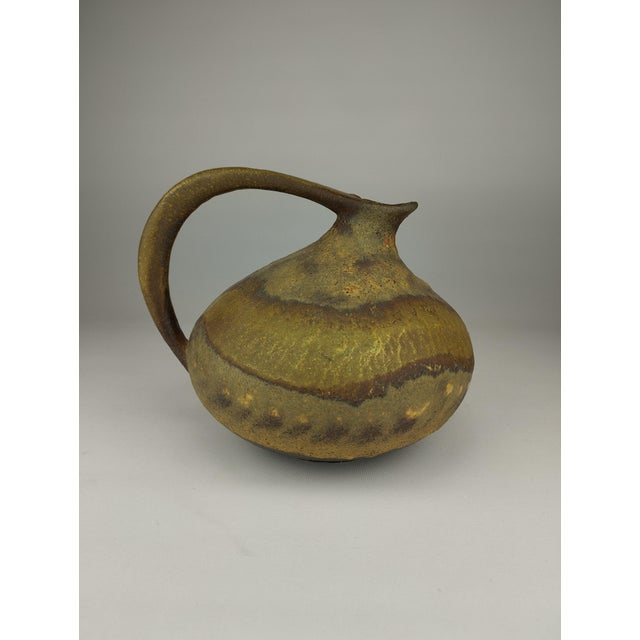 Mid-Century WGP Fat Lava Vase by Kurt Tschörner for Ruscha, in Flawless conditions. Designed 1960 to 1969 This piece has...