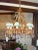 This hand-forged wrought iron chandelier is beautifully decorated with hand-cut European Crystals sure to complement any...
