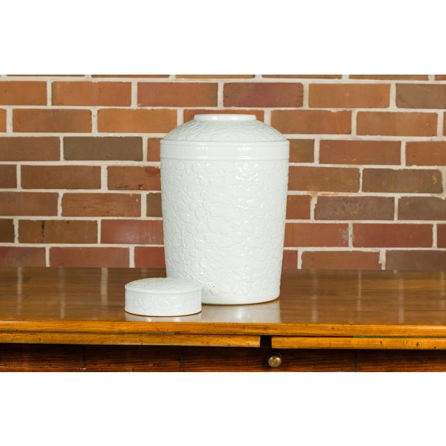 White Porcelain Asian Lidded Jar with Scrolling Foliage Motifs For Sale - Image 9 of 12