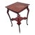 Antique 19th century Edwardian occasional table crafted from solid cherry wood. This elegant piece features a two-tier...
