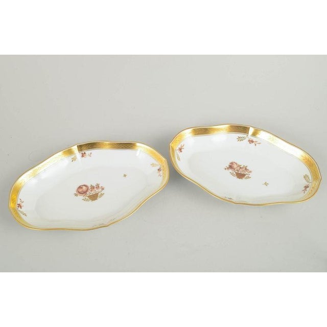 Royal Copenhagen Golden Basket, Pair of Cake Dishes. Set of two elegant porcelain cake dishes from Royal Copenhagen’s...