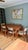 By Scandinavia Woodworks Co. featuring warm teak grain and 6 dining chairs- 4 side chairs and 2 with arms. The main table...