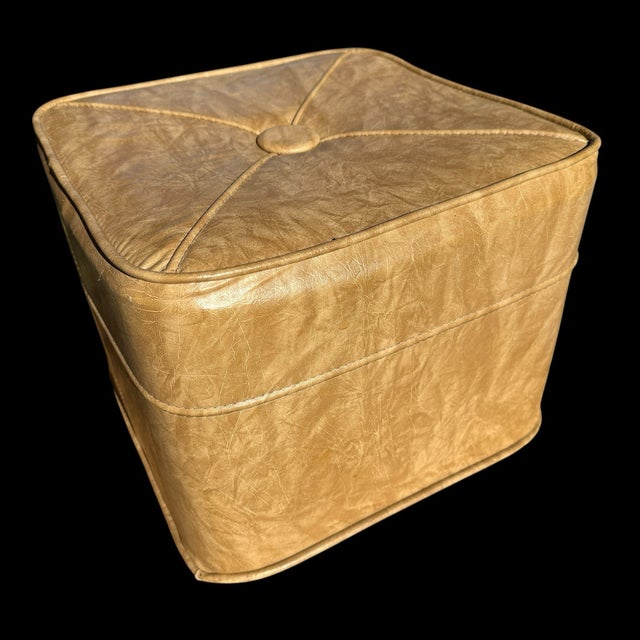 Complete your Mid-Century Modern interior with this **Vintage Cube Ottoman**, upholstered in classic **beige Naugahyde...