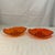This is a pair of vintage mid-century modern Viking Glass Epic candle holders in persimmon orange. Features a striking,...