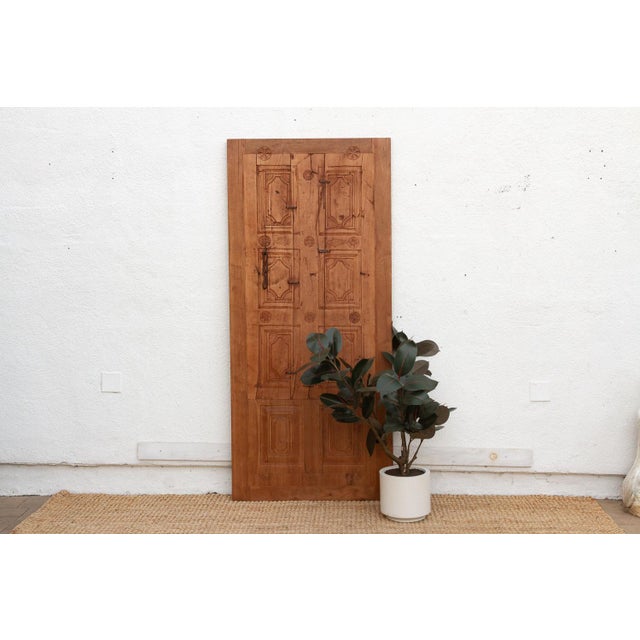 A beautiful fusion of function and folklore. This antique door has been expertly restored and resized to a standard 36" x...