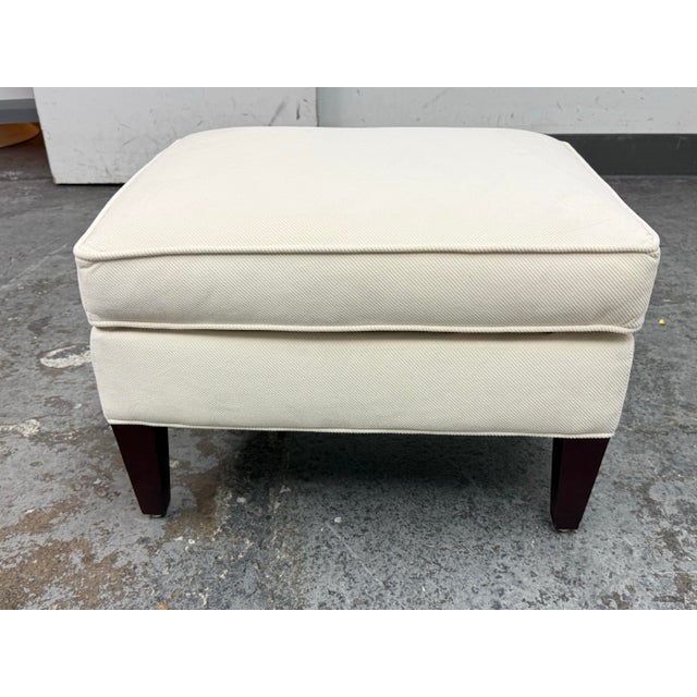 Design Plus Gallery presents a Time Square Ottoman by Rowe for Interline. This upholstered ottoman has a squared form with...