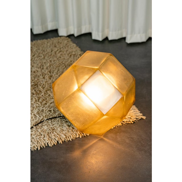 Industrial light pendant in acrylic glass. This important industrial lamp originally designed to be suspended can also...