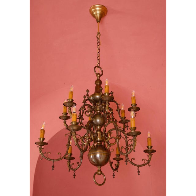 Large antique chandelier made of patinated metal made around 1900. Excellent quality with elaborate details. The...