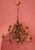 Large antique chandelier made of patinated metal made around 1900. Excellent quality with elaborate details. The...