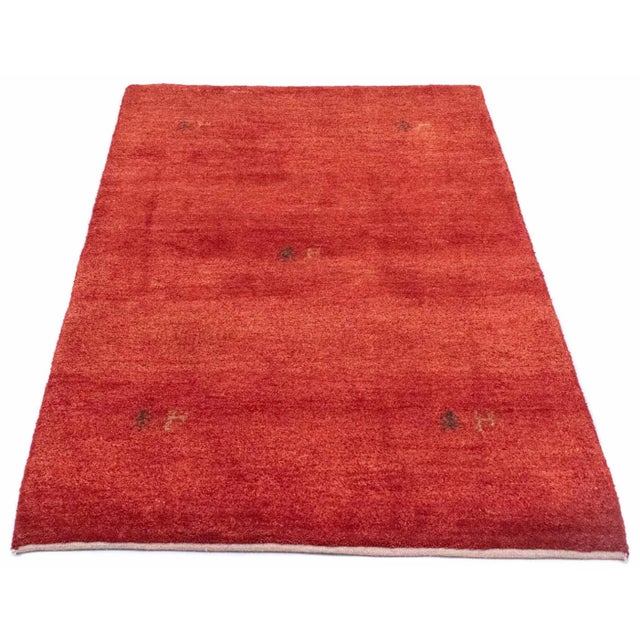 Gabbeh rug | Size: 147 x 98 cm | Knot density: 50.000 – 150.000 knots/m² | Material: Hand-spun sheep and goat wool |...