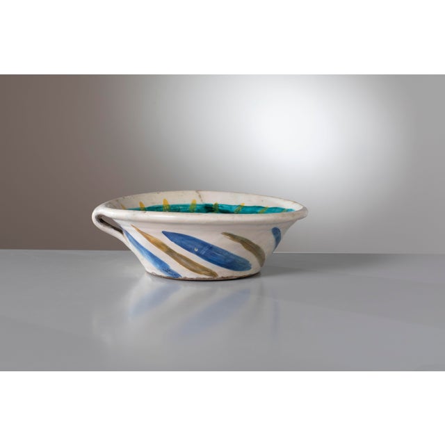 An extraordinary, museum-quality ceramic basin vase, representing a highly significant and rare example of the early...
