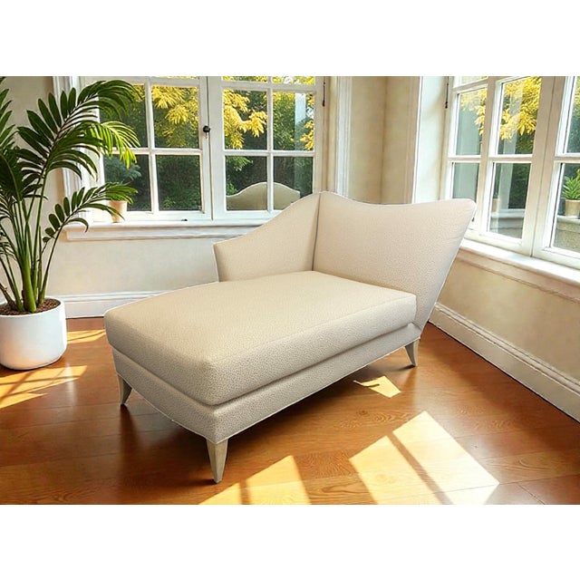 Vintage Swaim left arm chaise with Brunschwig & Fils animal motif fabric in soft hues of beige and tan, resting on light...