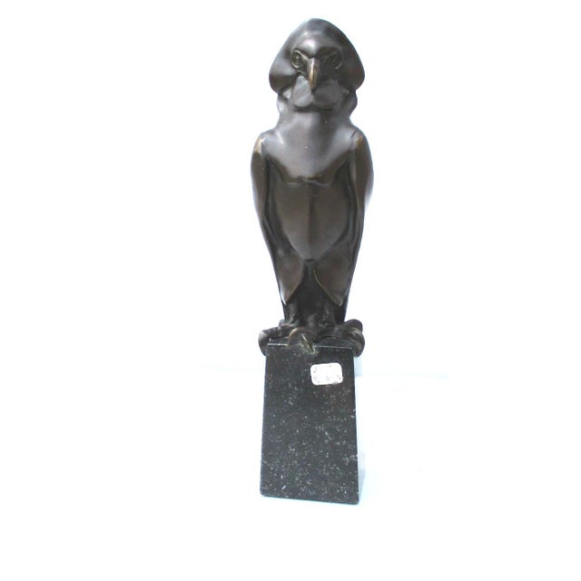 Early 20th century bronze of a crested bird of prey. Unsigned bronze on tapering porphyry plinth. Highly refined style of...