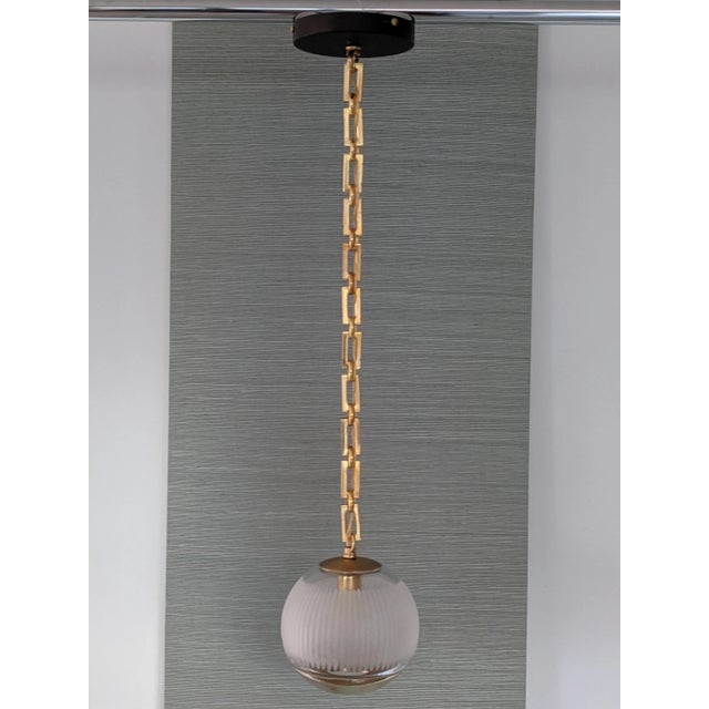 I love the great detail in this modern pendant. It has a crisp and clean look in black, white and gold. Would look sharp...