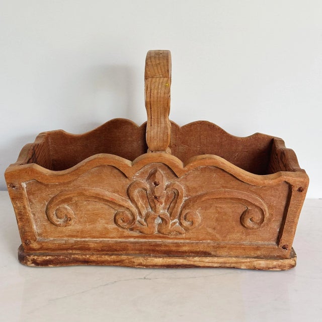 Antique French Country Hand Carved Basket in Heavily Grained Wood With Filigree Detail Measures approx: 16H x 13D x 22L...
