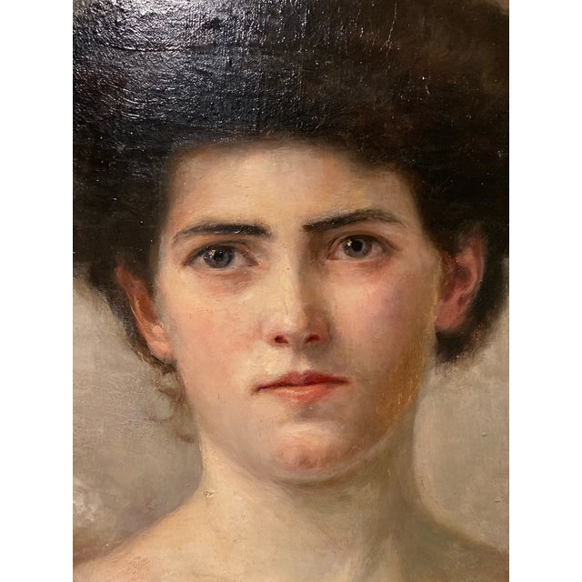 Oil painting Portrait on canvas signed C. Noebel Portrait of a lady holding narcissus. Oil on canvas painted in the oval....