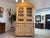 Restored 2-piece Gründerzeit shell-shaped kitchen sideboard, natural wood. Dimensions: Height x Width x Depth 247 x 136 x...