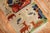 A late 20th-century full pile condition pictorial Tibetan rug Size: 2'3'' x 4'7''.
