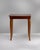 Mahogany side table in Rich Mahogany. Finished in rich mahogany, this mahogany side table is distinguished by curved sabre...