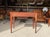 Small console table and or a small desk is in good used condition with small age related signs of wear. Stable and sound...