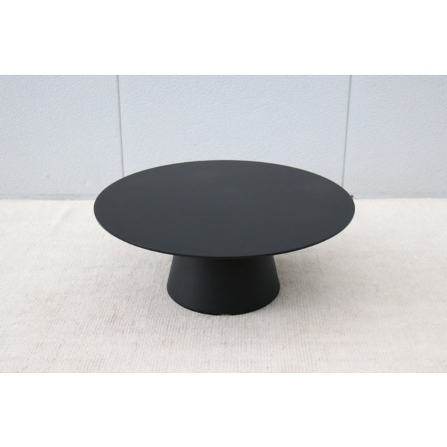 Fabulous, minimalist Reverse round occasional/coffee table in matte black finish, designed by Piergiorgio Cazzaniga for...