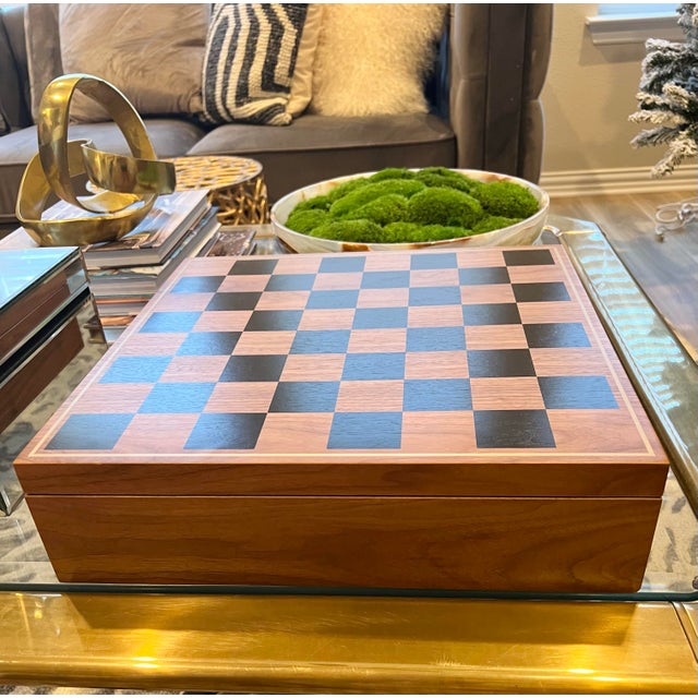 This beautiful wood table top chess board game set designed by Linley Mayfair is a must-have for any chess enthusiast....