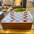 This beautiful wood table top chess board game set designed by Linley Mayfair is a must-have for any chess enthusiast....
