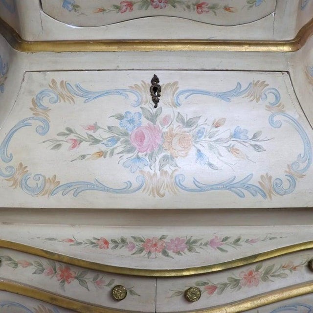 This antique Italian Niccolini secretary desk, dating to the 19th century, exemplifies the Rococo Revival style with its...