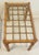 Elegant pair of mid century modern bamboo side tables with original glass tops.