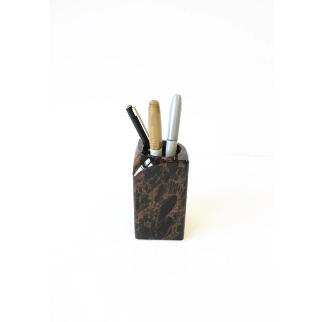 A '90s Postmodern black and brown polished marble stone desk pen pencil holder, circa 1990s. Dimensions: 2.5" square x...