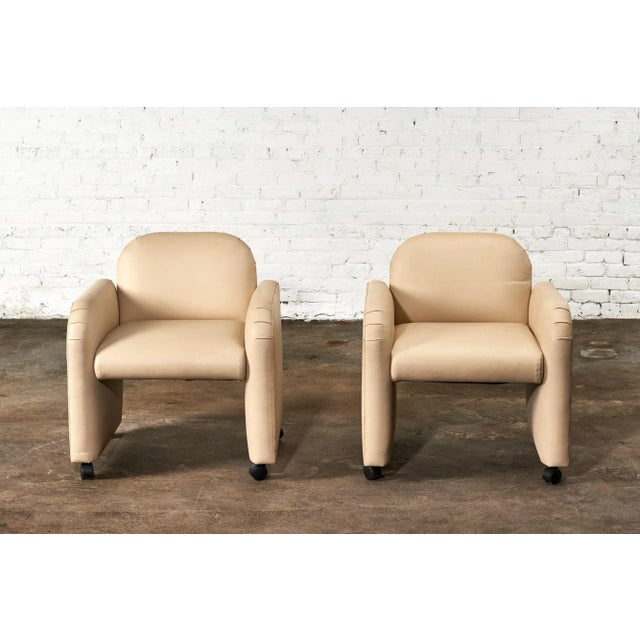 Pair leather barrel chair, 1980. Original leather.