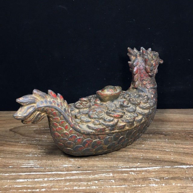 This vintage decorative sculpture is crafted from copper and takes the form of a traditional dragon boat. The piece is...