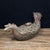 This vintage decorative sculpture is crafted from copper and takes the form of a traditional dragon boat. The piece is...