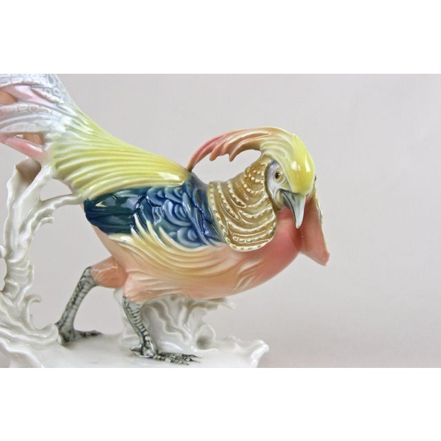 Lovely hand-painted golden pheasant porcelain figurine from the famous company of F. Karl Ens around 1920. Artfully...