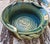 Bring tactile warmth and organic elegance to your tabletop with this striking, hand-thrown studio pottery serving bowl by...