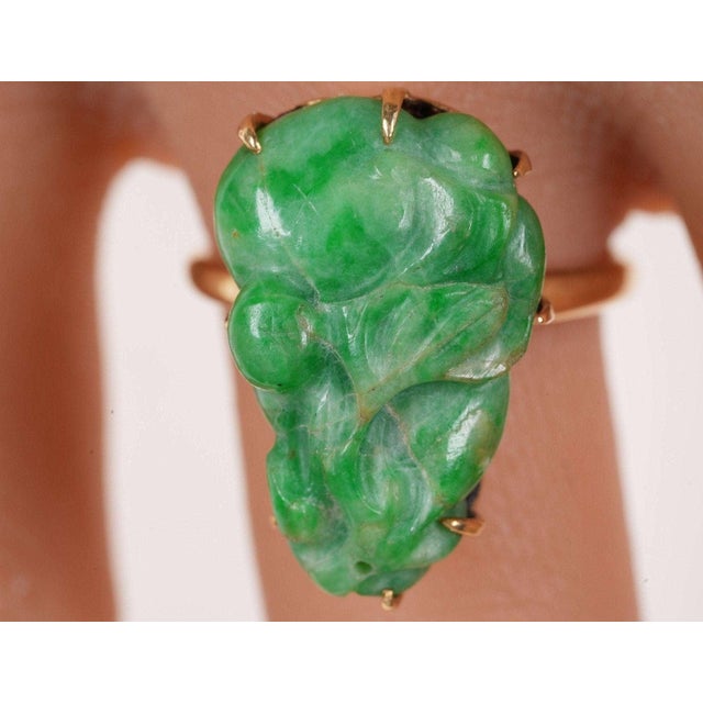 Antique Chinese 18k gold Jadeite ring. Very nice early setting unmarked, tested 18k gold. The jade piece is a very old...