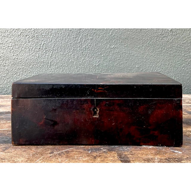 This exceptional vintage primitive box offers a masterclass in organic texture and understated elegance. The exterior is...