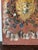 This rare hand-painted oil on wood memento Mori coat of arms heraldry wall plaque with painted goat under two swords on...