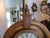 This vintage wood gingerbread mantle clock is a charming addition to any decor. With a bim-bam chime sequence and a...