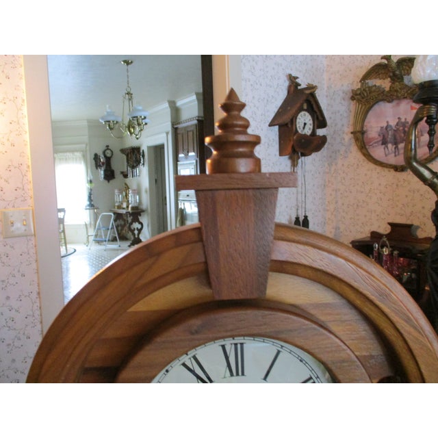 This vintage wood gingerbread mantle clock is a charming addition to any decor. With a bim-bam chime sequence and a...