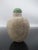 Antique chicken bone jade snuff bottle with green jade stopper, spoon intact. Ovoid shape with natural gray and white...