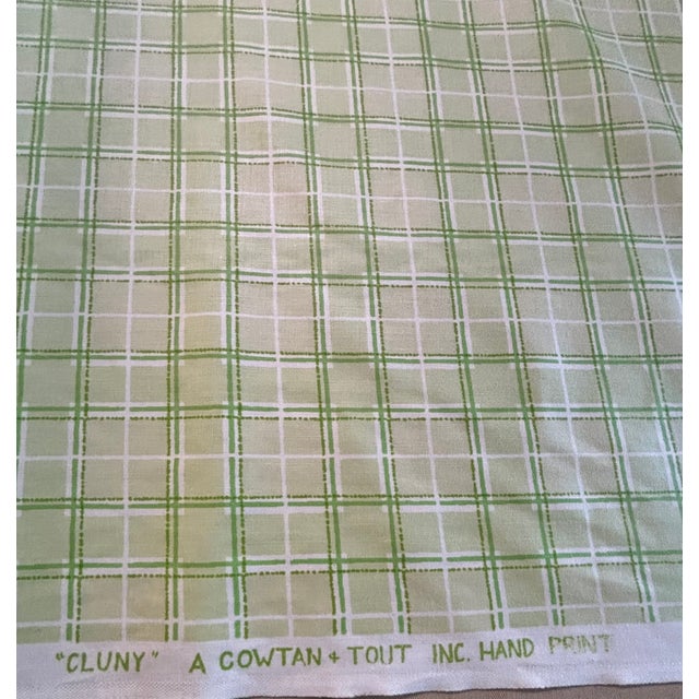Sample of lime green and white check fabric from Cowtan & Tout entitled “ Cluny”.
