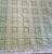 Sample of lime green and white check fabric from Cowtan & Tout entitled “ Cluny”.