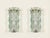 Stunning and unique pair of sculptural sconces in hand-chiseled glass and chromed metal. These incredibly elegant lights...