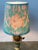A chandelier shade handmade from a circa 1880‘s French printed textile. Measurements: top 3” side 4” bottom 4”